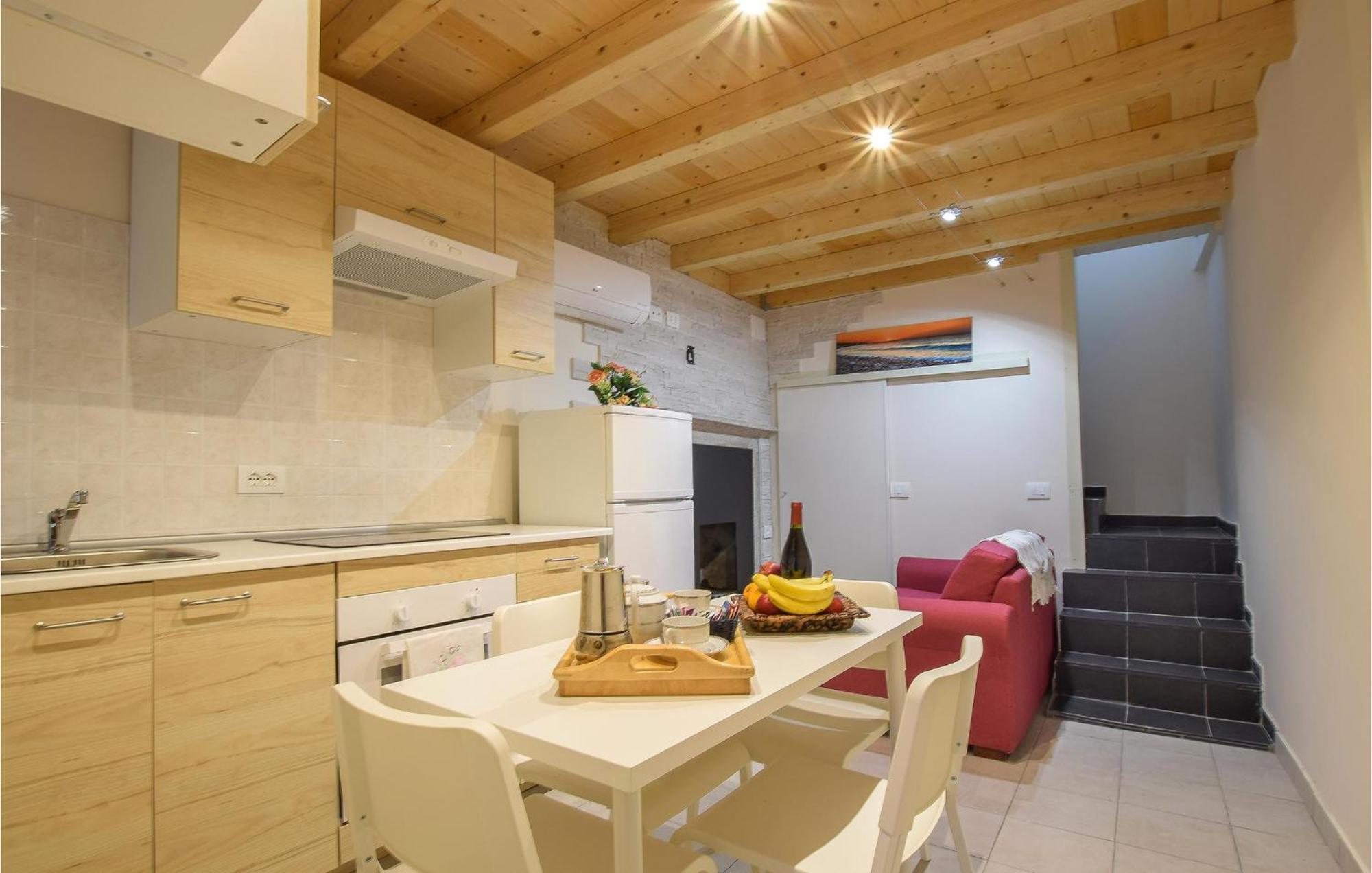 Stunning Apartment In Monte Isola With Kitchen Exterior photo